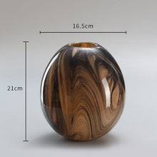 Black Ink In Brown Glass Vase