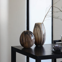 Black Ink In Brown Glass Vase
