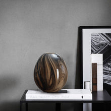 Black Ink In Brown Glass Vase