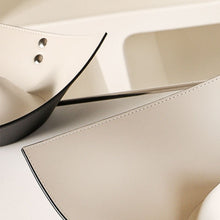Triangular contrasting color storage tray