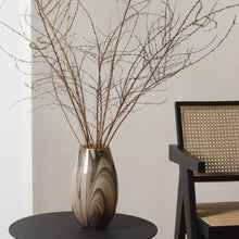 Black Ink In Brown Glass Vase