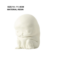 Small Baby Face Paper Weight