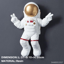 Astronaut and Planet Wall Decor