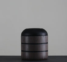 Ribbed black flower vase