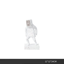 Half Men Figurine