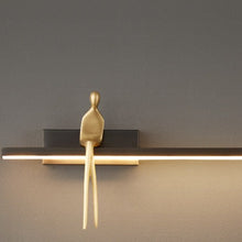 Golden Man Sitting Wall Light