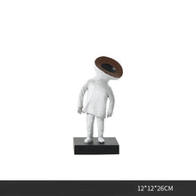 Half Men Figurine