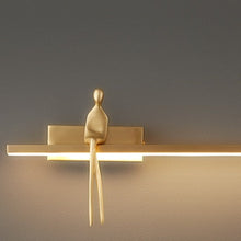 Golden Man Sitting Wall Light