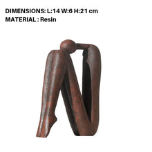 Sitting Stickman Figurine