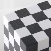 Black-and-white lattice marble cube