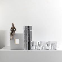 Thinker multi layer bookend